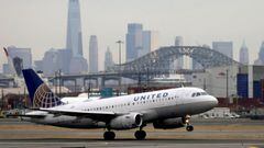 FILE PHOTO: A United Airlines passenger jet takes off with New York City as a backdrop, at Newark Liberty International Airport, New Jersey, U.S. December 6, 2019. REUTERS/Chris Helgren/File Photo