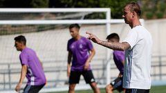 Guti (right) takes training as Under-19s boss.