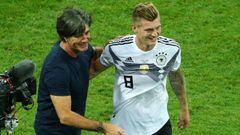 Kroos y Low celebran el triunfo de Alemania.