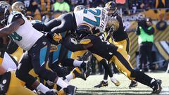 PITTSBURGH, PA - JANUARY 14: Leonard Fournette #27 of the Jacksonville Jaguars dives into the end zone for a touchdown against the Pittsburgh Steelers during the first half of the AFC Divisional Playoff game at Heinz Field on January 14, 2018 in Pittsburgh, Pennsylvania.   Rob Carr/Getty Images/AFP == FOR NEWSPAPERS, INTERNET, TELCOS &amp; TELEVISION USE ONLY ==