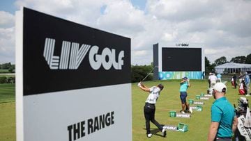 Players practice on the driving range ahead of ahead of the forthcoming LIV Golf Invitational Series event at The Centurion Club in St Albans, north of London, on June 7, 2022. - Former world number one golfer Dustin Johnson confirmed on Tuesday he has resigned his membership of the US PGA Tour to play in the breakaway LIV Golf Invitational Series. The decision effectively rules the American two-time major winner out of participating in the Ryder Cup, which pits the United States against Europe every two years. Six-time major winner Phil Mickelson confirmed on Monday he had also signed up to play in the inaugural LIV event in a major coup for the organisers. (Photo by ADRIAN DENNIS / AFP) (Photo by ADRIAN DENNIS/AFP via Getty Images)