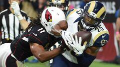 GLENDALE, AZ - OCTOBER 02: Strong safety T.J. McDonald #25 of the Los Angeles Rams intercepts a pass in front of wide receiver Larry Fitzgerald #11 of the Arizona Cardinals during the second half of the NFL game against the Los Angeles Rams at University of Phoenix Stadium on October 2, 2016 in Glendale, Arizona. The Los Angeles Rams won 17-13.   Norm Hall/Getty Images/AFP == FOR NEWSPAPERS, INTERNET, TELCOS &amp; TELEVISION USE ONLY ==