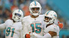 Nov 7, 2021; Miami Gardens, Florida, USA; Miami Dolphins outside linebacker Jaelan Phillips (15) celebrates with safety Brandon Jones (29) after sacking Houston Texans quarterback Tyrod Taylor (not pictured) during the second half of the game at Hard Rock