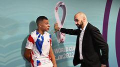 AL KHOR, QATAR - DECEMBER 14: Kylian Mbappe of France speaks with Walid Regragui, Head Coach of Morocco, in the tunnel after the FIFA World Cup Qatar 2022 semi final match between France and Morocco at Al Bayt Stadium on December 14, 2022 in Al Khor, Qatar. (Photo by Michael Regan - FIFA/FIFA via Getty Images)
