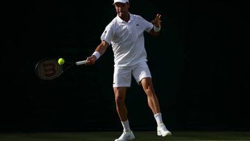 LONDON, ENGLAND - JUNE 28: Roberto Bautista Agut of Spain plays a forehand against Attila Balazs of Hungary during their Men's Singles First Round Match on day two of The Championships Wimbledon 2022 at All England Lawn Tennis and Croquet Club on June 28, 2022 in London, England. (Photo by Julian Finney/Getty Images)