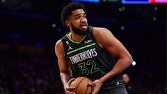 Apr 11, 2023; Los Angeles, California, USA; Minnesota Timberwolves center Karl-Anthony Towns (32) controls the ball against the Los Angeles Lakers during the first half at Crypto.com Arena. Mandatory Credit: Gary A. Vasquez-USA TODAY Sports