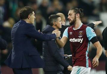 West Ham United manager Slaven Bilic with West Ham United's Andy Carroll as he is substituted