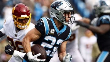 Christian McCaffrey of the Carolina Panthers runs against the