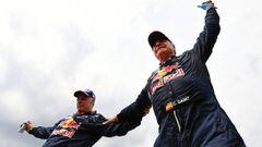 Peugeot&#039;s Spanish driver Carlos Sainz (R) and co-driver Lucas Cruz of Spain celebrate after winning the Dakar Rally 2018, at the end of the last stage in and around Cordoba province in Argentina on January 20, 2018.  Sainz won the Dakar Rally 2018