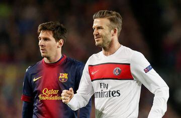 Future Inter Miami star Lionel Messi takes on future Inter Miami co-owner David Beckham during Barcelona vs PSG. 