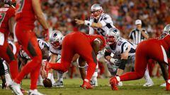 TAMPA, FL - OCTOBER 5: Quarterback Tom Brady #12 of the New England Patriots controls the offense during the second quarter of an NFL football game Tampa Bay Buccaneers on October 5, 2017 at Raymond James Stadium in Tampa, Florida.   Brian Blanco/Getty Images/AFP == FOR NEWSPAPERS, INTERNET, TELCOS &amp; TELEVISION USE ONLY ==