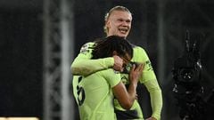 Manchester City's Norwegian striker Erling Haaland (R) celebrates with Manchester City's Dutch defender Nathan Ake(L) after the English Premier League football match between Crystal Palace and Manchester City at Selhurst Park in south London on March 11, 2023. - Manchester City won the game 1-0. (Photo by Ben Stansall / AFP) / RESTRICTED TO EDITORIAL USE. No use with unauthorized audio, video, data, fixture lists, club/league logos or 'live' services. Online in-match use limited to 120 images. An additional 40 images may be used in extra time. No video emulation. Social media in-match use limited to 120 images. An additional 40 images may be used in extra time. No use in betting publications, games or single club/league/player publications. / 