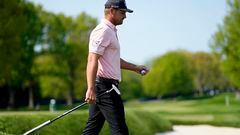 Golf’s big hitter is back competing in a major tournament and is currently on top of the leaderboard with a new slim look and odd-looking swing