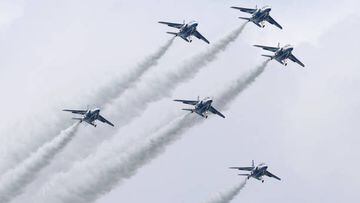 The Japan Air Self-Defense Force's Blue Impulse aerobatic team flies over Miyako island in Okinawa Prefecture, southern Japan, on Dec. 11, 2022, marking the 50th anniversary of an ASDF base on the island. (Photo by Kyodo News via Getty Images)