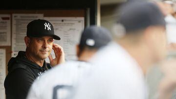 NEW YORK, NEW YORK - AUGUST 16: Manager Aaron Boone #17 of the New York Yankees looks on from the dugout during the first inning against the Tampa Bay Rays at Yankee Stadium on August 16, 2022 in the Bronx borough of New York City.   Sarah Stier/Getty Images/AFP
== FOR NEWSPAPERS, INTERNET, TELCOS & TELEVISION USE ONLY ==