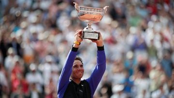 Tennis - French Open - Roland Garros, Paris, France - June 11, 2017   Spain&#039;s Rafael Nadal celebrates with the trophy after winning the final against Switzerland&#039;s Stan Wawrinka   Reuters / Benoit Tessier