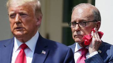 White House economic adviser Larry Kudlow listens as U.S. President Donald Trump talks about a U.S. jobs report amid the coronavirus disease (COVID-19) pandemic during a news conference in the Rose Garden at the White House in Washington, U.S., June 5, 20