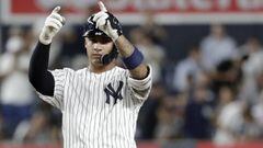 New York Yankees&#039; Gleyber Torres gestures after hitting a double off Boston Red Sox starting pitcher Nathan Eovaldi during the sixth inning of a baseball game Tuesday, Sept. 18, 2018, in New York. (AP Photo/Julio Cortez)