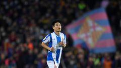 BARCELONA, SPAIN - NOVEMBER 20: Wu Lei of Espanyol runs onto the pitch during the La Liga Santander match between FC Barcelona and RCD Espanyol at Camp Nou on November 20, 2021 in Barcelona, Spain. (Photo by Alex Caparros/Getty Images)