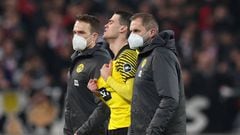 Dortmund's Giovanni Reyna leaves the pitch injured. (Photo by Tom Weller/picture alliance via Getty Images)
