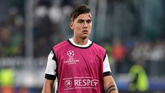 Juventus&#039; forward from Argentina Paulo Dybala walks on the pitch before the UEFA Champions League Group D football match Juventus vs Sporting CP at the Juventus stadium on October 17, 2017 in Turin.  / AFP PHOTO / Miguel MEDINA