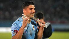 MONTEVIDEO, URUGUAY - MARCH 24: Luis Suarez of Uruguay celebrates qualifying after winning a match between Uruguay and Peru as part of FIFA World Cup Qatar 2022 Qualifiers at Centenario Stadium on March 24, 2022 in Montevideo, Uruguay. (Photo by Matilde C