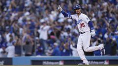 Los Angeles Dodgers center fielder Cody Bellinger reacts after hitting a three-run home run during the eighth inning in Game 3 of baseball&#039;s National League Championship Series against the Atlanta Braves Tuesday, Oct. 19, 2021, in Los Angeles. (AP Ph