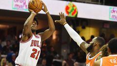 Jan 4, 2017; Cleveland, OH, USA; Chicago Bulls forward Jimmy Butler (21) shoots over the defense of Cleveland Cavaliers forward LeBron James (23) during the second half at Quicken Loans Arena. Mandatory Credit: Ken Blaze-USA TODAY Sports