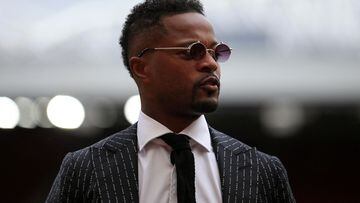 (FILES) This file photo taken on May 21, 2022 shows Manchester United's Patrice Evra at Old Trafford in Manchester, north-west England on May 21, 2022. - A Paris court will rule on February 9, 2023 on a case over charges of "homophobic insults" against Evra. (Photo by Lindsey Parnaby / AFP)