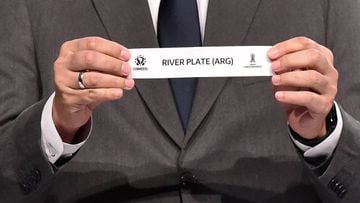 LUQUE, PARAGUAY - MAY 27: Director of Competitions of CONMEBOL Fred Nantes draws out the card of River Plate during the draw for the matches of Round of Sixteen of Copa CONMEBOL Libertadores  at Centro de Convenciones de la Conmebol on May 27, 2022 in Luque, Paraguay. (Photo by Norberto Duarte-Pool/Getty Images)