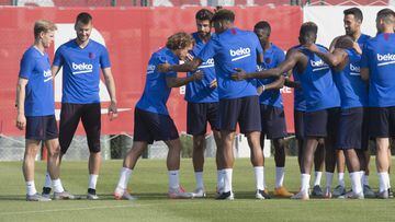 Barcelona players give Griezmann, De Jong and Neto the traditional welcome as the new arrivals are invited to run the gauntlet of "collejas" - well-meaning attempts to land a slap on the back of the new boys' necks.
