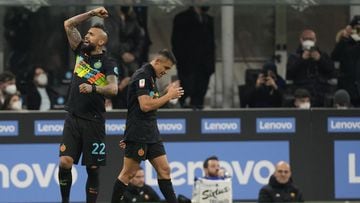 Inter Milan&#039;s Alexis Sanchez, right, celebrates with his teammate Arturo Vidal, after scores against Roma during the Italian Cup soccer match between Inter Milan and Roma at the San Siro stadium, in Milan, Italy, on Tuesday, Feb. 8, 2022. (AP Photo/A