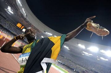 Usain Bolt of Jamaica celebrates after his team won the men's 4x100m relay athletics final in the National Stadium during the Beijing 2008 Olympic Games August 22, 2008.