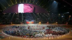 A general view of the Khalifa Stadium with the Qatari flag being displayed on a screen during the closing ceremony of the 15th Asian Games in Doha, December 15, 2006. 