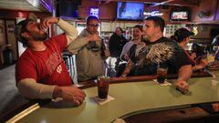 Customers drink at the Somewhere bar in Fond du Lac, Wisconsin, USA, 14 May 2020.
