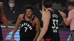 Toronto Raptors&#039; Kyle Lowry (7) celebrates with teammate Marc Gasol (33) during the second half of an NBA conference semifinal playoff basketball game against the Boston Celtics Saturday, Sept. 5, 2020, in Lake Buena Vista, Fla. (AP Photo/Mark J. Terrill)