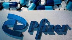 A 3D printed Pfizer logo is placed near medicines from the same manufacturer in this illustration taken September 29, 2021.