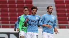 Jugadores de Uruguay en calentamiento previo a partido por Eliminatorias