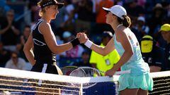 TORONTO, ONTARIO - AUGUST 11: Beatriz Haddad Maia of Brazil and Iga Swiatek of Poland shake hands at the net after their third round match on Day 6 of the National Bank Open, part of the Hologic WTA Tour, at Sobeys Stadium on August 11, 2022 in Toronto, Ontario (Photo by Robert Prange/Getty Images)