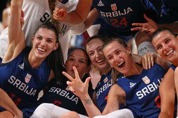 Serbia's women's basketball players celebrate after winning the quarterfinal match against China.