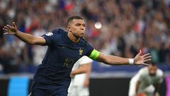 France's forward Kylian Mbappe celebrates after scoring the team's first goal during the UEFA Euro 2024 group B qualification football match between France and Greece at the Stade de France in Saint-Denis, in the northern outskirts of Paris, on June 19, 2023. (Photo by FRANCK FIFE / AFP)