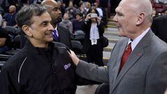 (FILES) In this file photo taken on February 20, 2015, head coach George Karl of the Sacramento Kings (R) gets greeted by the owner Vivek Ranadive (L) prior to the start of the game against the Boston Celtics at Sleep Train Arena on in Sacramento, Califor