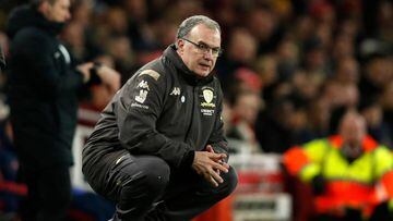 (FILES) In this file photo taken on January 6, 2020 Leeds United&#039;s Argentinian head coach Marcelo Bielsa watches from the touchline duirng the English FA Cup third round football match between Arsenal and Leeds United at The Emirates Stadium in London. - For a man nicknamed &#039;El Loco&#039; (mad man) and with little silverware in his long managerial career, Marcelo Bielsa is an unlikely hero to a younger generation of coaches. However, hordes of Leeds fans will now treat him with similar reverence after he guided one of English football&#039;s sleeping giants back to the Premier League after a 16-year wait. (Photo by Adrian DENNIS / AFP)