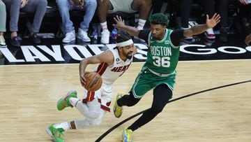 Gabe Vincent #2 of the Miami Heat drives against Marcus Smart #36 of the Boston Celtics