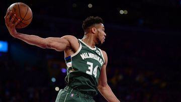 Feb 8, 2022; Los Angeles, California, USA; Milwaukee Bucks forward Giannis Antetokounmpo (34) gets a rebound against the Los Angeles Lakers during the first half at Crypto.com Arena. Mandatory Credit: Gary A. Vasquez-USA TODAY Sports