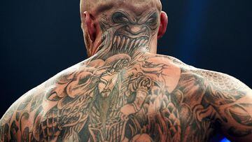 COPENHAGEN, DENMARK - MARCH 14: Detail view of tattoos on the back of Patrick Nielsen (red-black shorts) of Denmark after his WBA International Super Middleweight Title match against George Tahdooahnippah (gold shorts) of USA in the Clash of the Clans Nordic Fight Night Boxing at Ballerup Super Arena on March 14, 2015 in Copenhagen, Denmark. (Photo by Lars Ronbog / FrontZoneSport via Getty Images) TATUAJE TATTOO