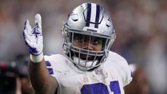 ARLINGTON, TEXAS - JANUARY 05: Ezekiel Elliott #21 of the Dallas Cowboys gestures for a first down in the second quarter against the Seattle Seahawks during the Wild Card Round at AT&amp;T Stadium on January 05, 2019 in Arlington, Texas.   Tom Pennington/