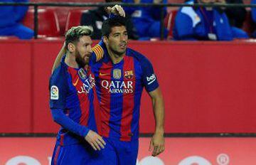 Suarez celebrates with Messi