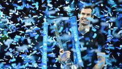 Britain&#039;s Andy Murray celebrating with the trophy after winning the men&#039;s singles final on the eighth and final day of the ATP World Tour Finals tennis tournament in London. 