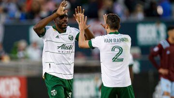 Nov 25, 2021; Commerce City, CO, USA; Portland Timbers defender Larrys Mabiala (33) celebrates with defender Jose van Rankin (2) after scoring a goal in the second half against the Colorado Rapids at Dick&#039;s Sporting Goods Park. Mandatory Credit: Isai